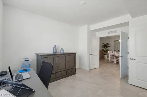 a room with furniture and a window