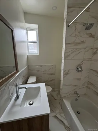 a bathroom with a sink and a tub