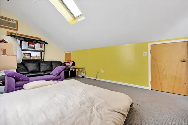 a bed room with a bed and furniture
