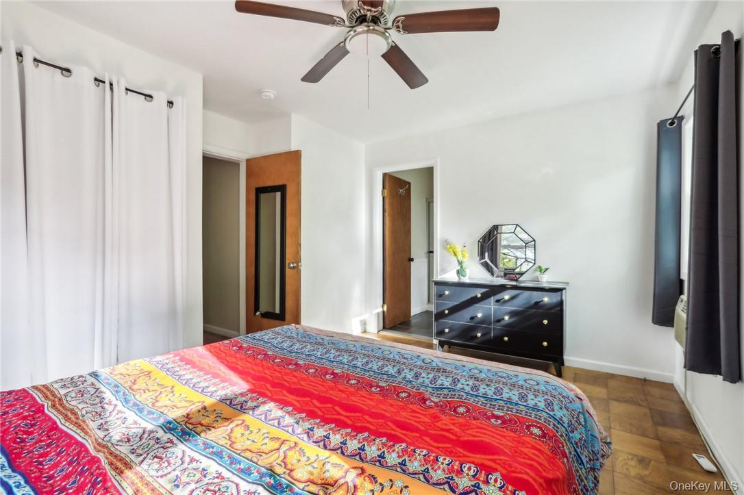 5 Beverly Trail Monroe, NY 10950 - Photo 20 of 24 a bedroom with a bed and a dresser