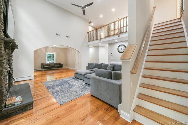 a living room with furniture and a rug