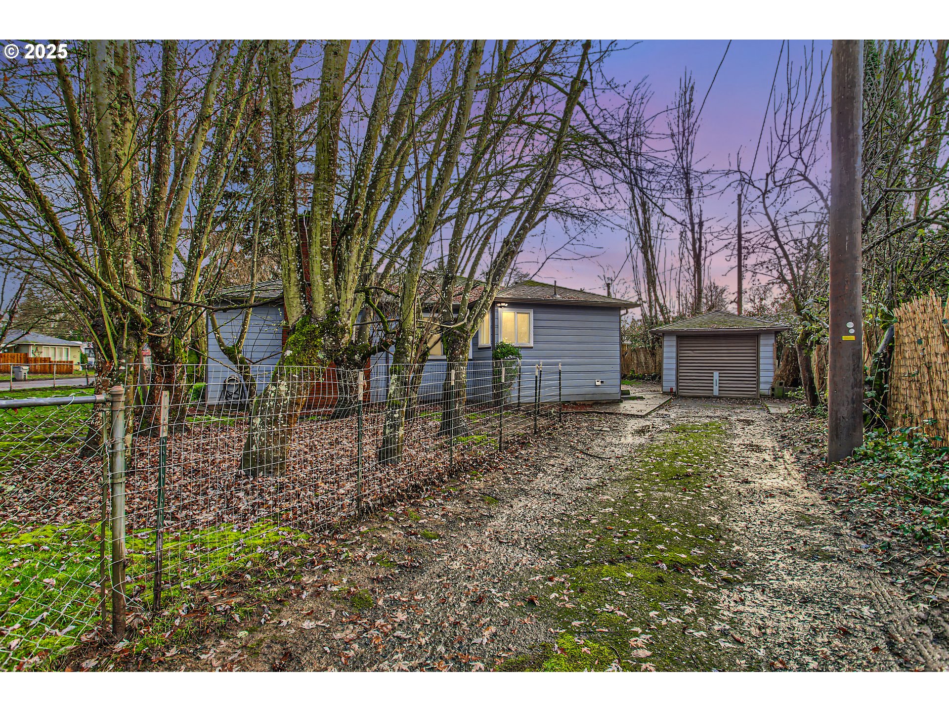 245 Southwest 133rd Avenue Beaverton, OR 97005 - Photo 11 of 12 a backyard of a house with lots of green space