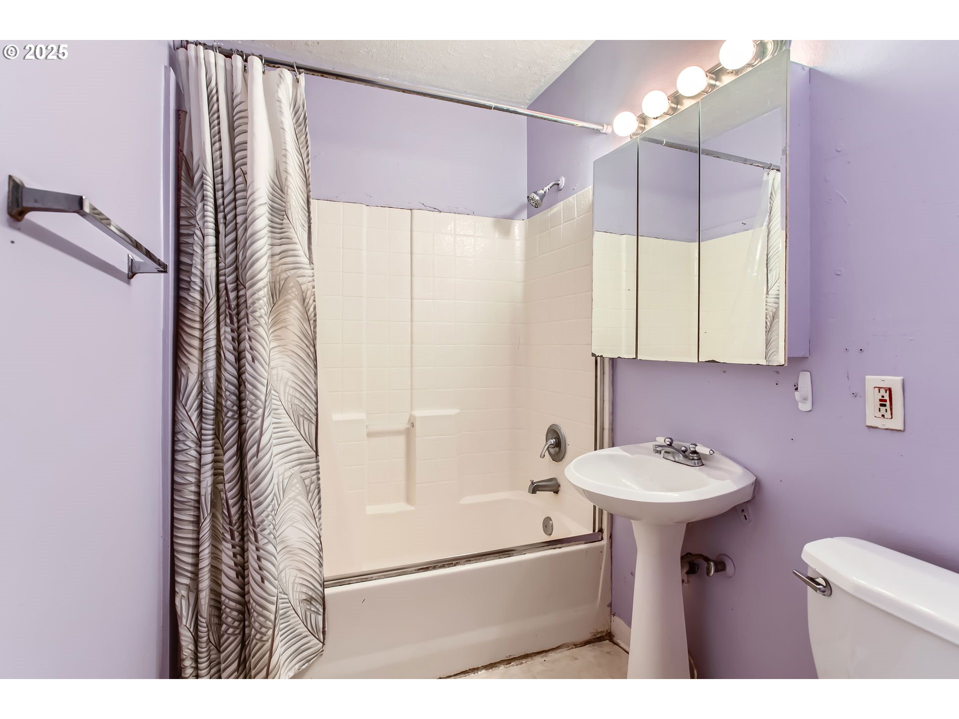 245 Southwest 133rd Avenue Beaverton, OR 97005 - Photo 8 of 12 a bathroom with a sink toilet and shower