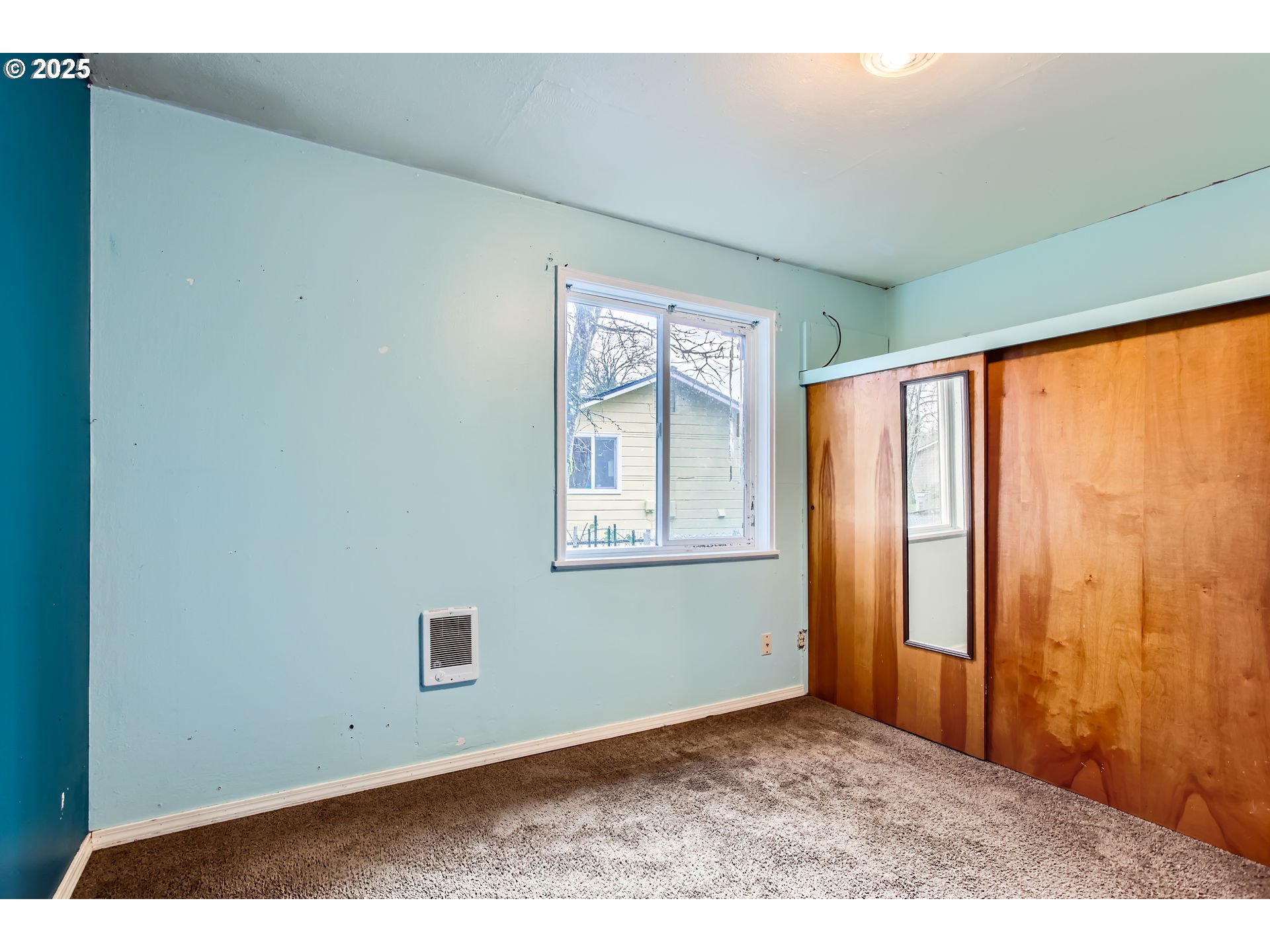 245 Southwest 133rd Avenue Beaverton, OR 97005 - Photo 9 of 12 a view of empty room with windows
