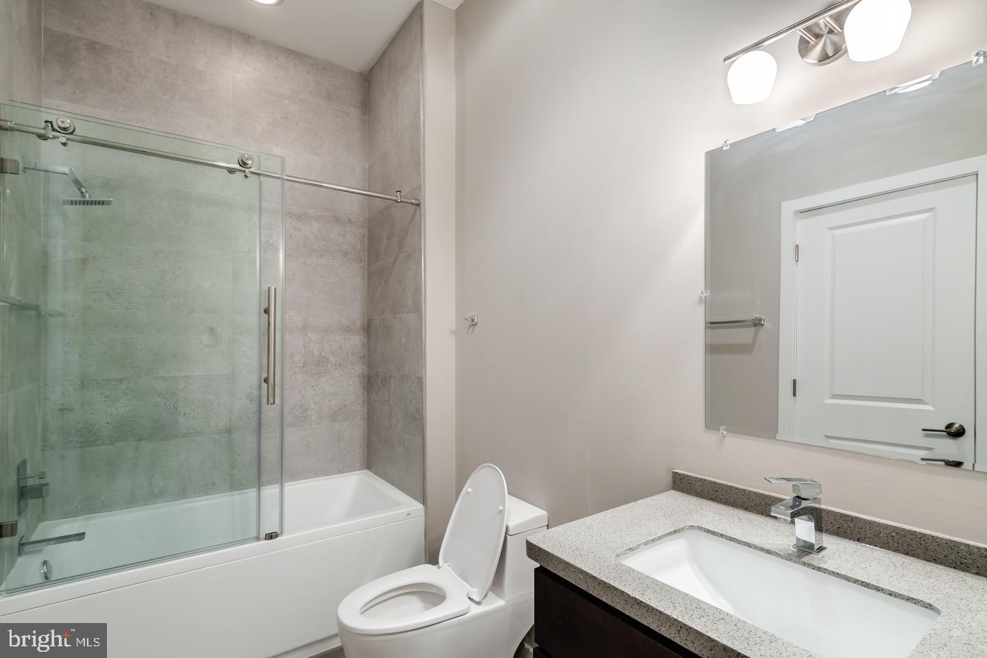 1636 Ridge Avenue, Unit PH Philadelphia, PA 19130 - Photo 11 of 16 a bathroom with a sink toilet and shower