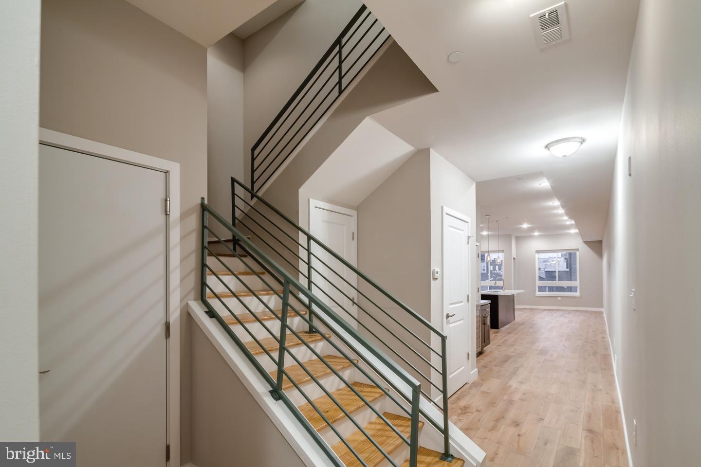 1636 Ridge Avenue, Unit PH Philadelphia, PA 19130 - Photo 6 of 16 a view of a hallway with entryway and wooden floor