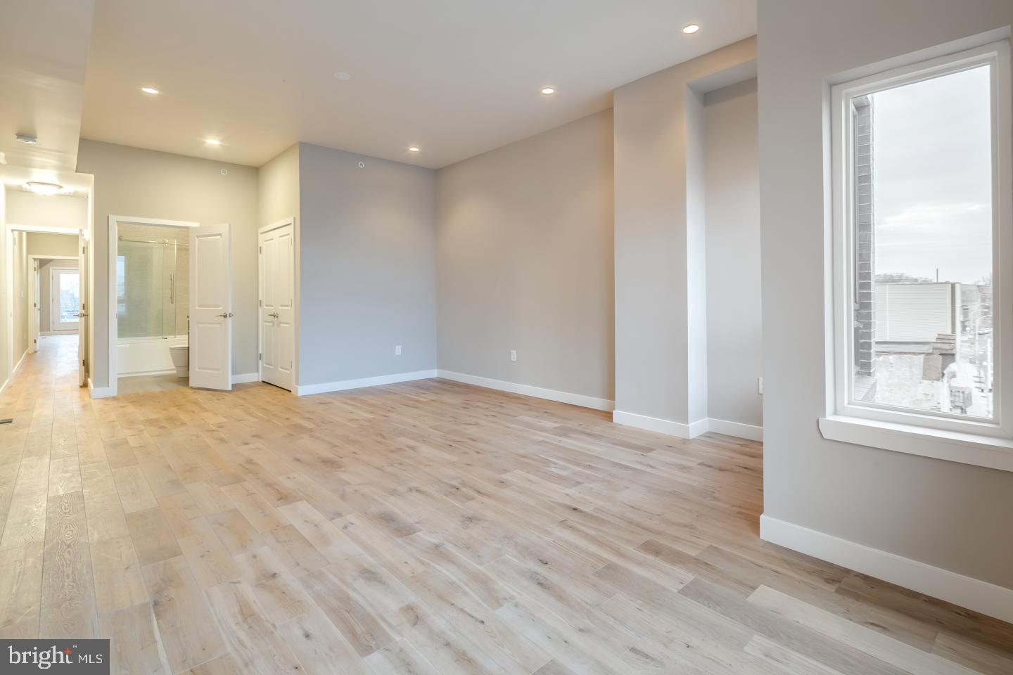 1636 Ridge Avenue, Unit PH Philadelphia, PA 19130 - Photo 9 of 16 a view of empty room with wooden floor and fan