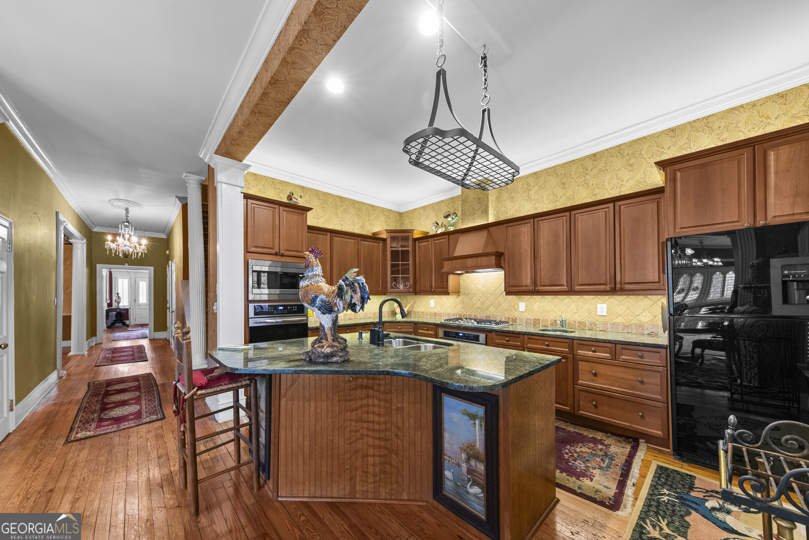 1155 Floyd Street Northeast Covington, GA 30014 - Photo 19 of 65 a kitchen with a sink appliances and cabinets
