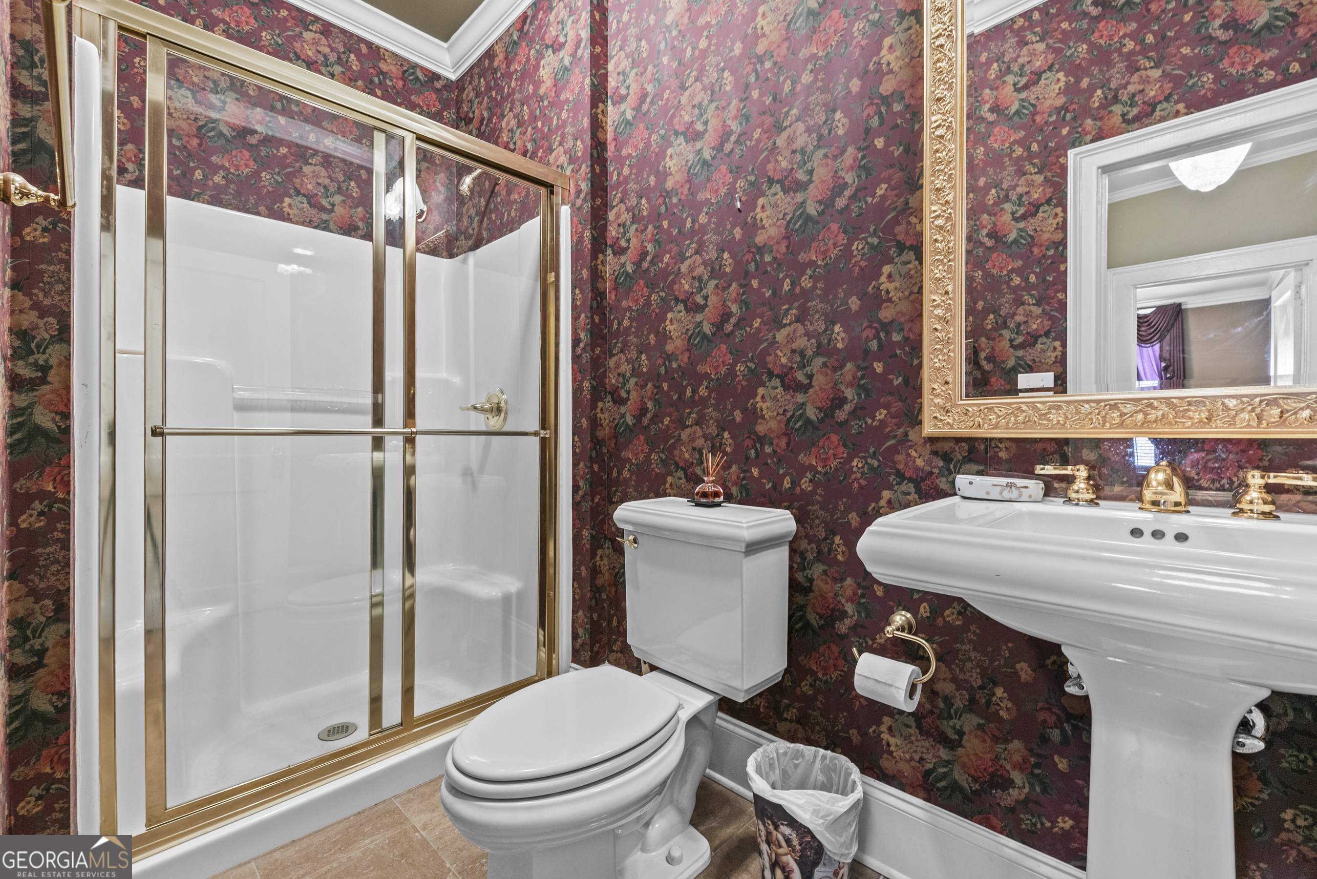 1155 Floyd Street Northeast Covington, GA 30014 - Photo 36 of 65 a bathroom with a sink toilet and shower