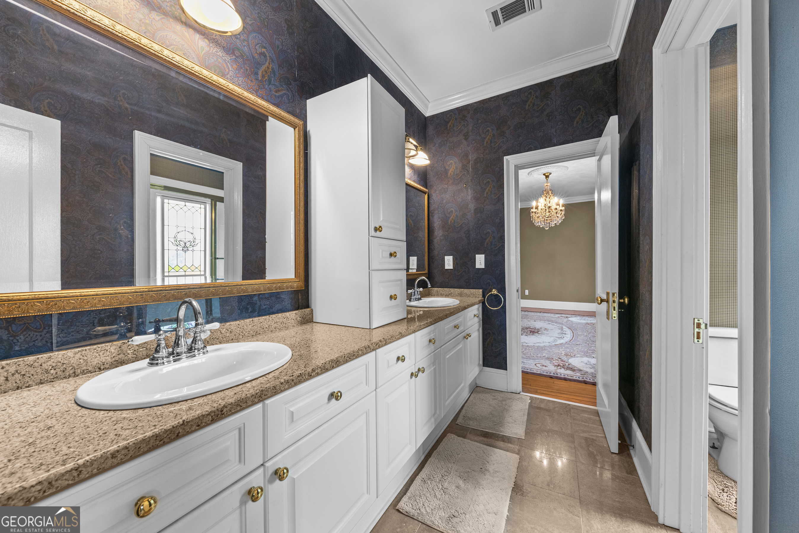 1155 Floyd Street Northeast Covington, GA 30014 - Photo 49 of 65 a bathroom with a granite countertop sink and a mirror