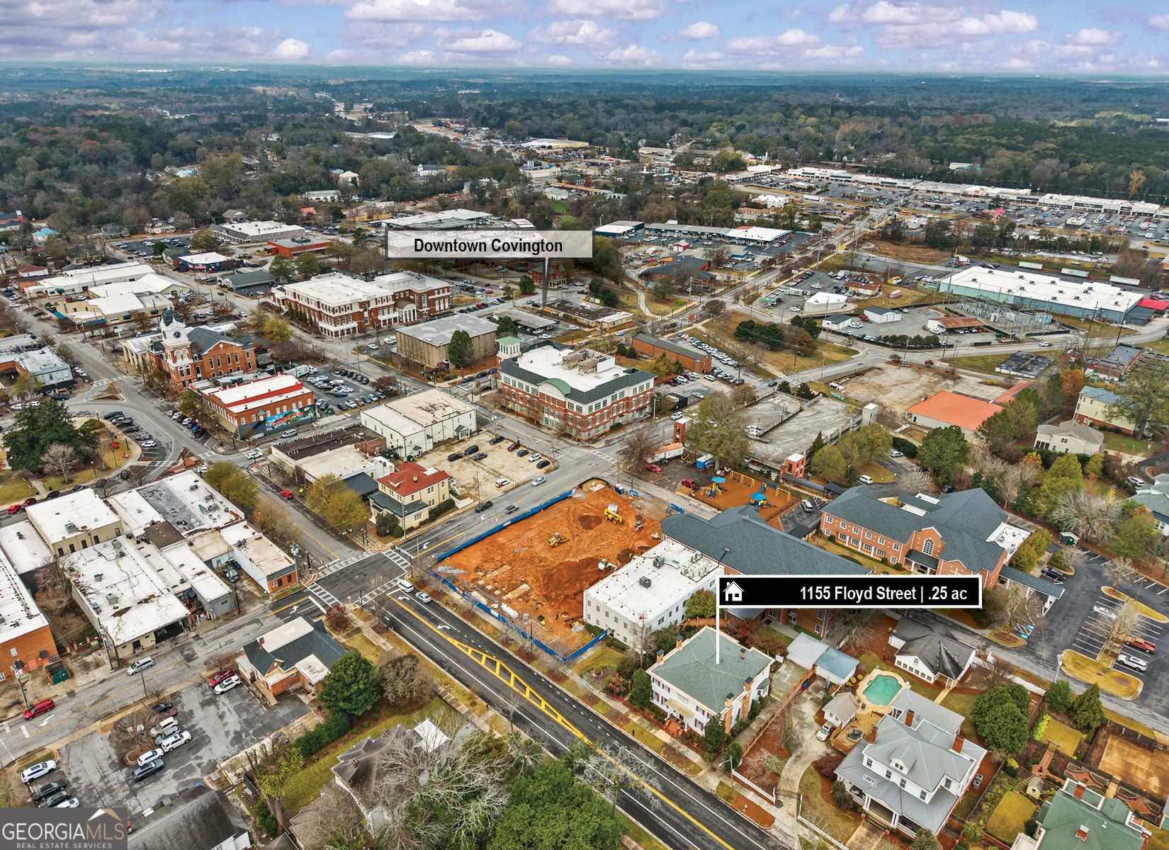 1155 Floyd Street Northeast Covington, GA 30014 - Photo 59 of 65 an aerial view of residential houses with outdoor space and river