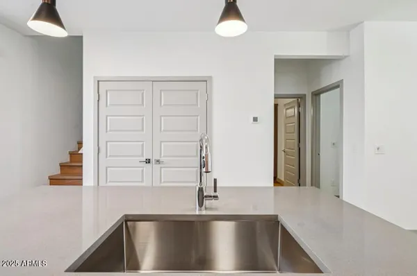 a view of a kitchen with a sink