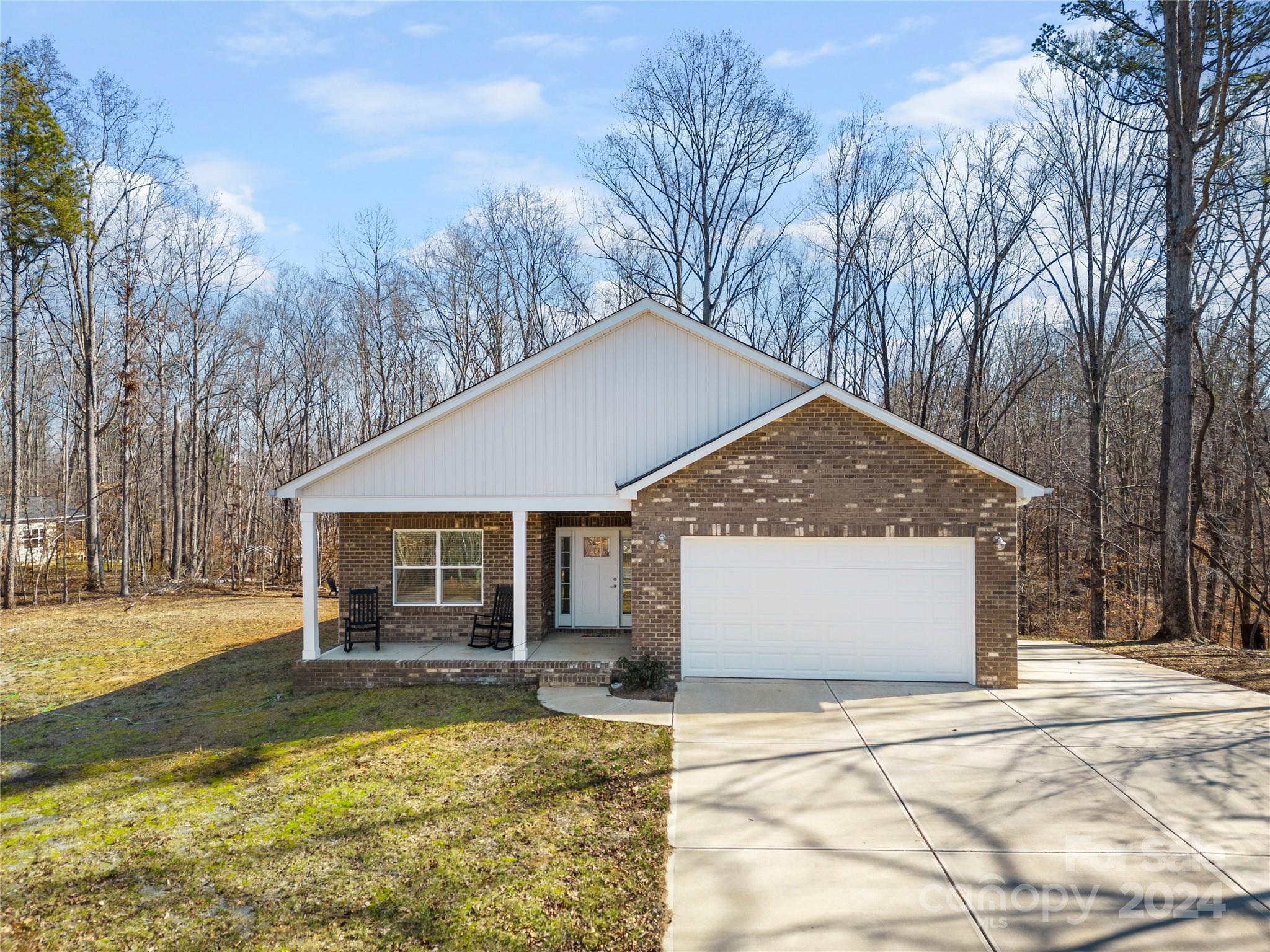 218 Rambler Lane Blacksburg, SC 29702 - Photo 1 of 42 a view of a house with pool and sitting area