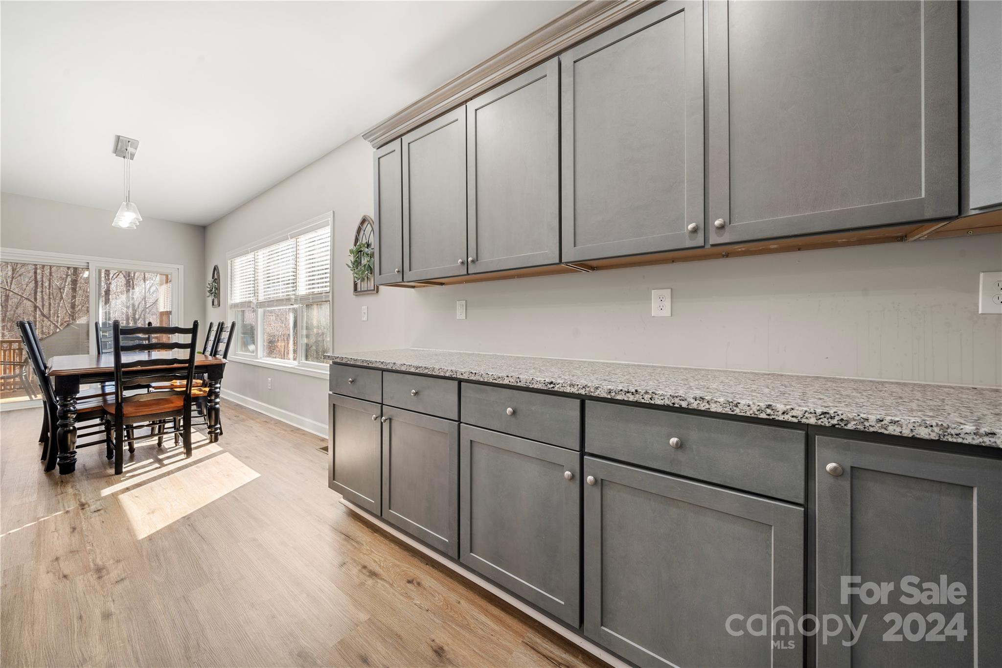 218 Rambler Lane Blacksburg, SC 29702 - Photo 12 of 42 a kitchen with stainless steel appliances granite countertop a sink and cabinets