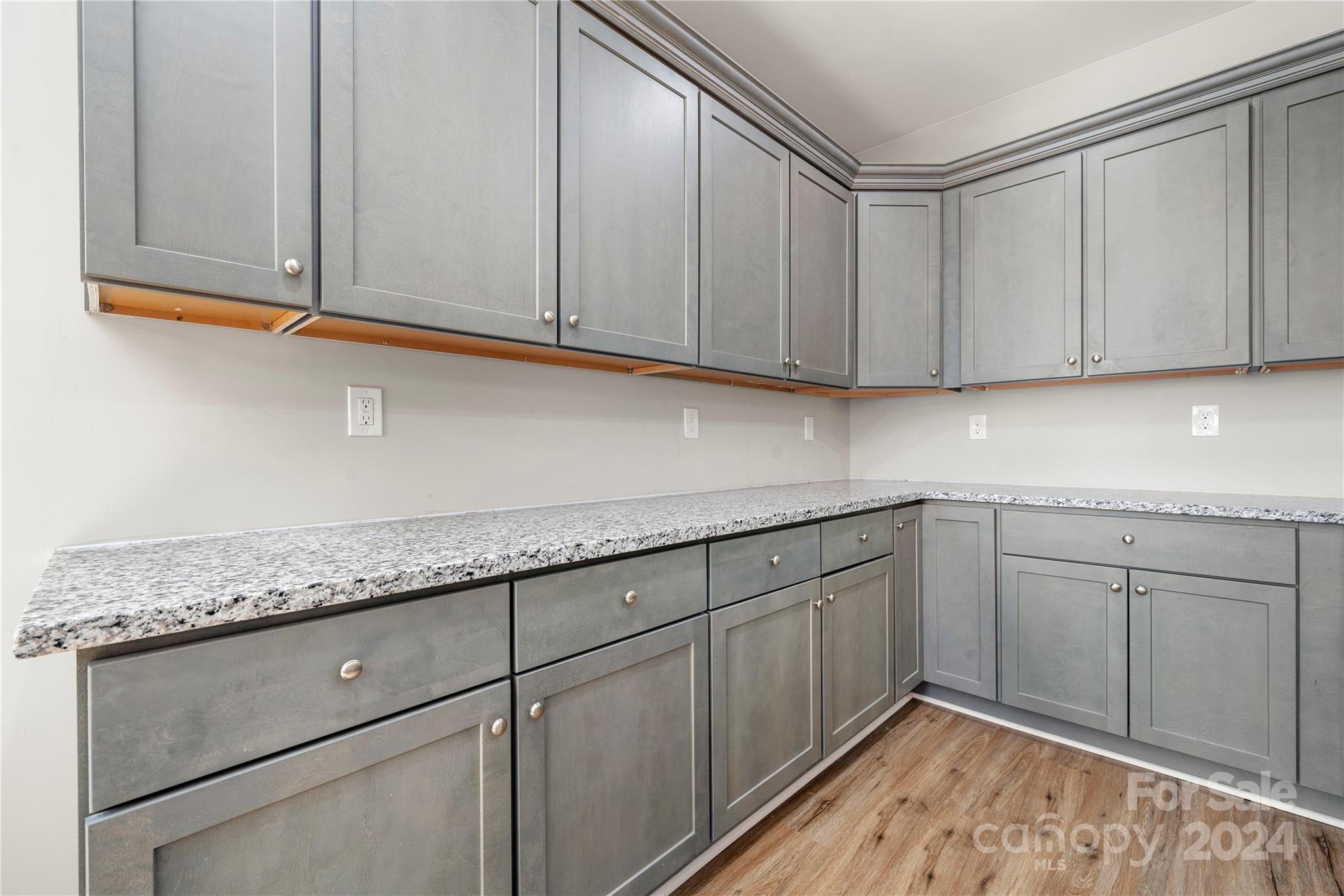 218 Rambler Lane Blacksburg, SC 29702 - Photo 13 of 42 a kitchen with granite countertop cabinets and white appliances