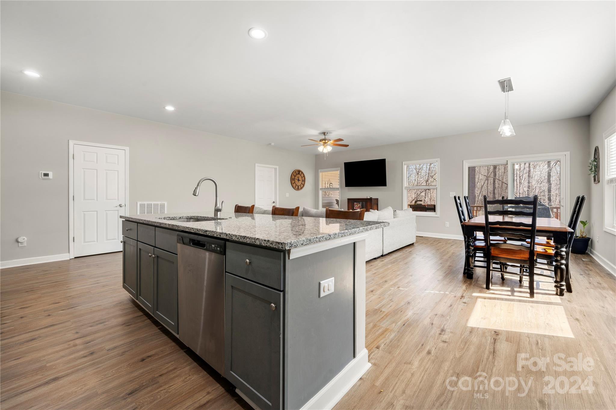 218 Rambler Lane Blacksburg, SC 29702 - Photo 16 of 42 a kitchen with stainless steel appliances kitchen island granite countertop a sink and cabinets