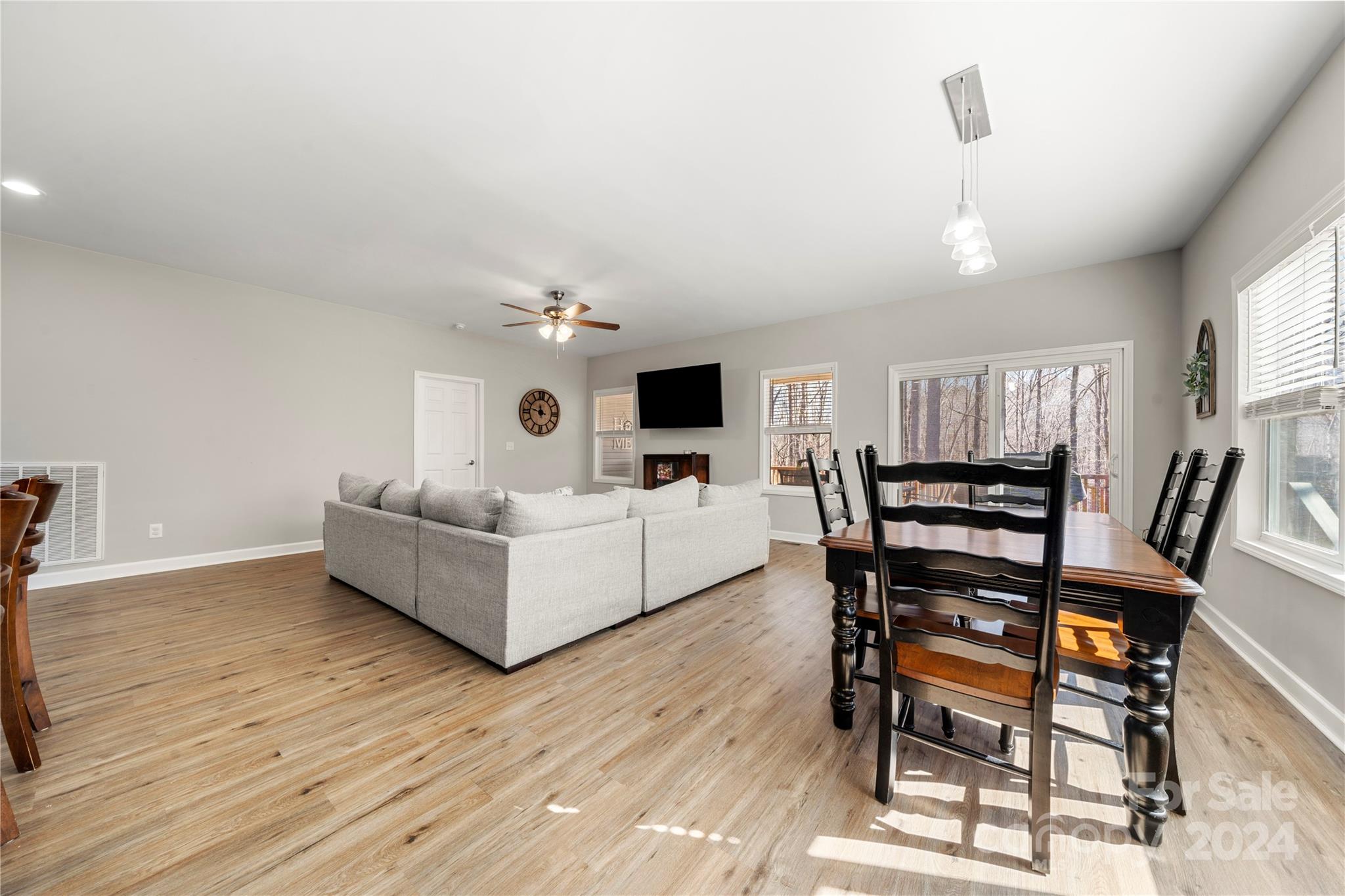 218 Rambler Lane Blacksburg, SC 29702 - Photo 18 of 42 a living room with furniture and a flat screen tv