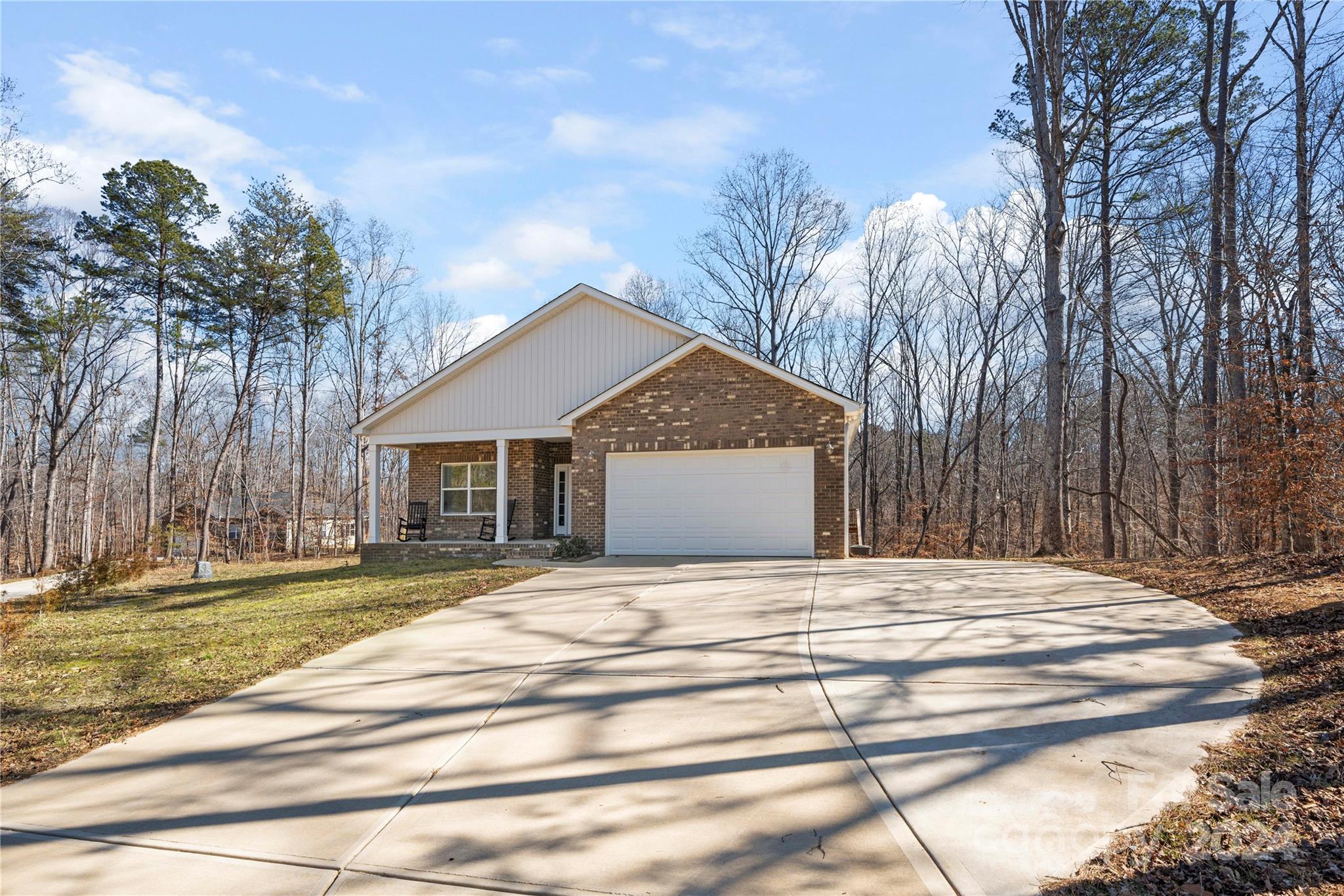 218 Rambler Lane Blacksburg, SC 29702 - Photo 2 of 42 a house with trees in front of it