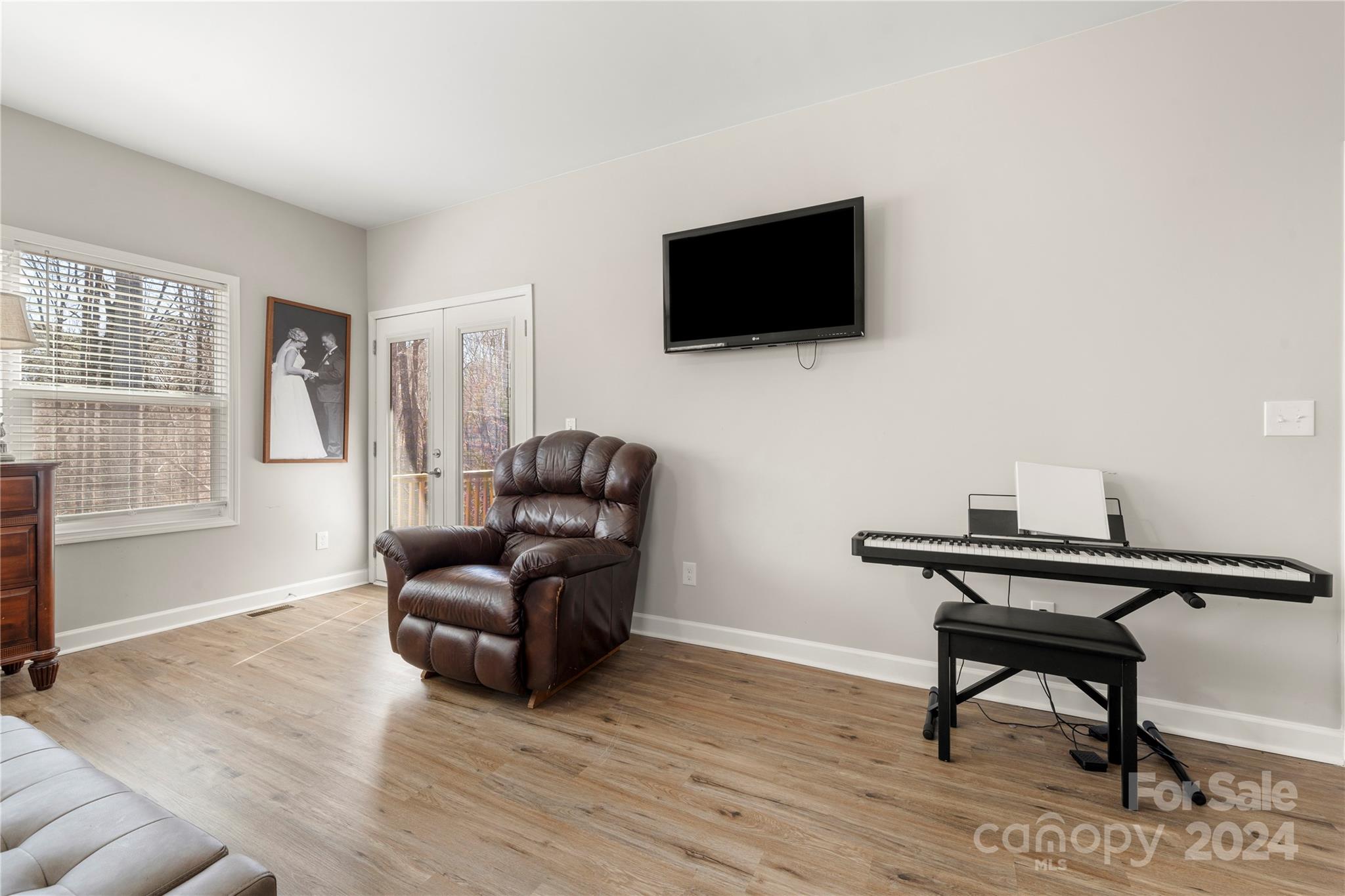 218 Rambler Lane Blacksburg, SC 29702 - Photo 29 of 42 a living room with furniture and a flat screen tv