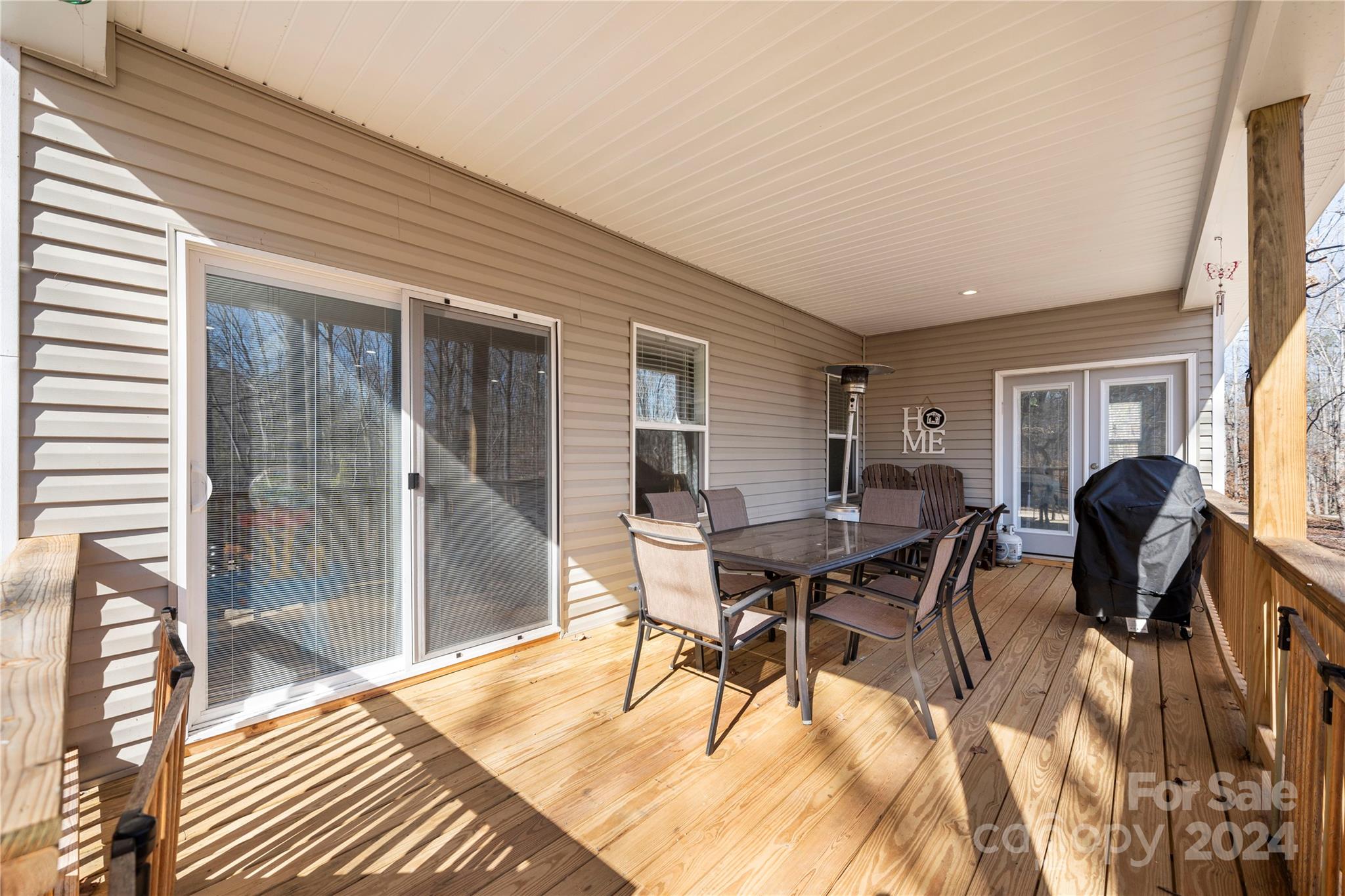 218 Rambler Lane Blacksburg, SC 29702 - Photo 36 of 42 a view of a dining room with furniture and wooden floor