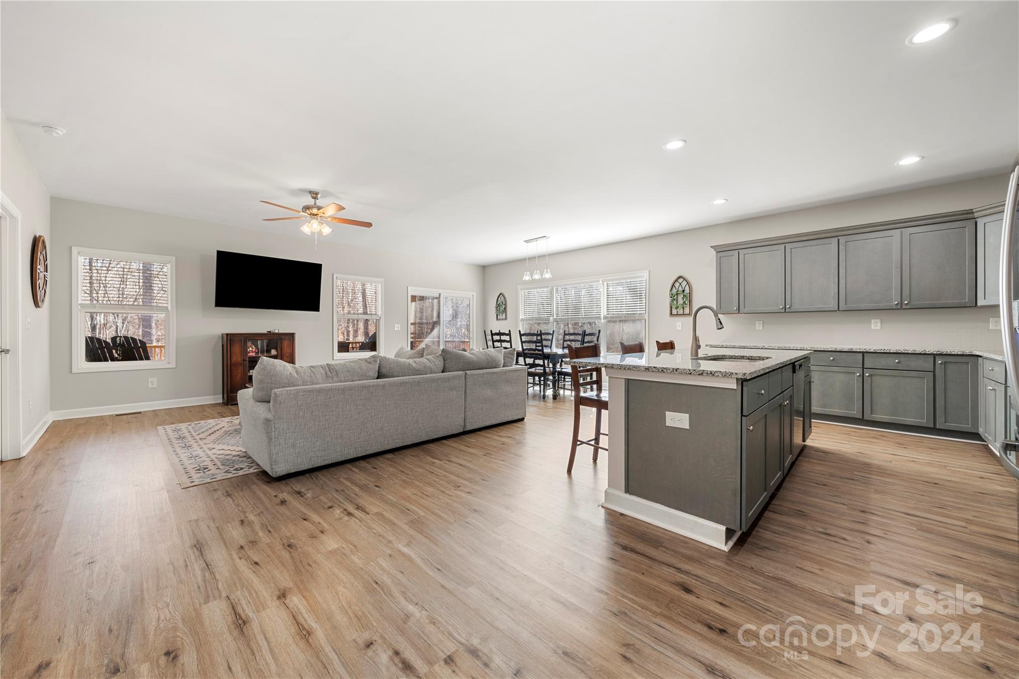 218 Rambler Lane Blacksburg, SC 29702 - Photo 6 of 42 a living room with a couch and a flat screen tv