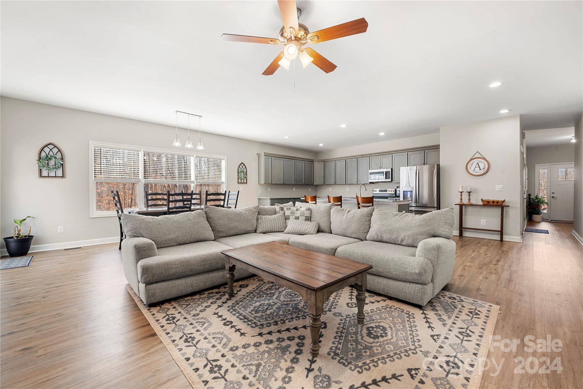 218 Rambler Lane Blacksburg, SC 29702 - Photo 8 of 42 a living room with furniture and wooden floor