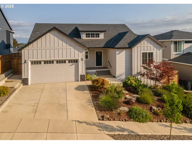 a view of hallway with wooden floor