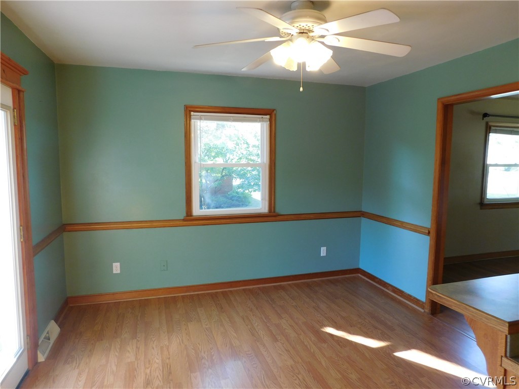8311 Hopkins Road North Chesterfield, VA 23237 - Photo 11 of 39 a view of room with window and wooden floor