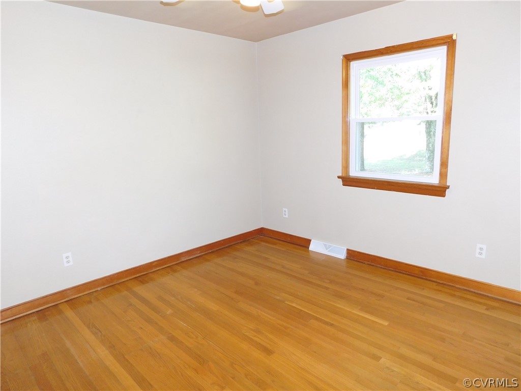 8311 Hopkins Road North Chesterfield, VA 23237 - Photo 21 of 39 a view of an empty room with a window