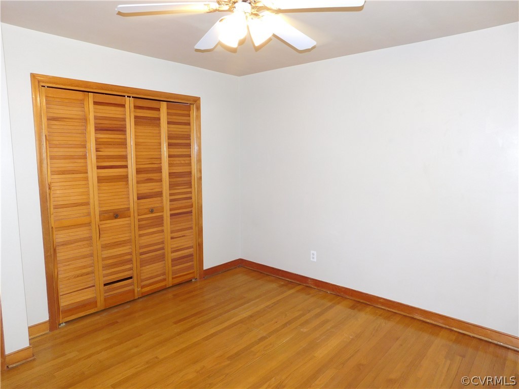 8311 Hopkins Road North Chesterfield, VA 23237 - Photo 22 of 39 wooden floor in an empty room