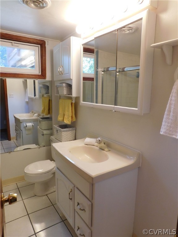 8311 Hopkins Road North Chesterfield, VA 23237 - Photo 29 of 39 a bathroom with a sink toilet and mirror