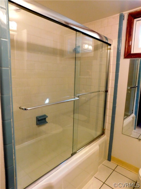 8311 Hopkins Road North Chesterfield, VA 23237 - Photo 30 of 39 a bathroom with a glass shower door