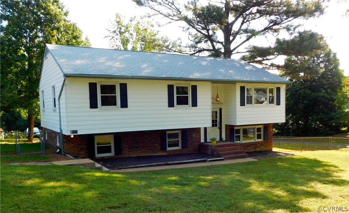 8311 Hopkins Road North Chesterfield, VA 23237 - Photo 3 of 39 a view of house with a yard