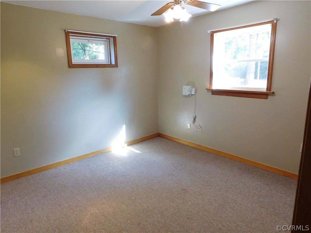 8311 Hopkins Road North Chesterfield, VA 23237 - Photo 31 of 39 an empty room with windows