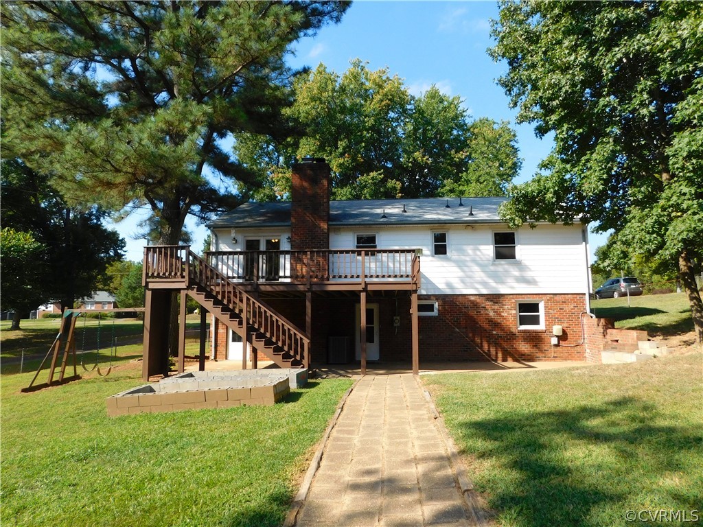 8311 Hopkins Road North Chesterfield, VA 23237 - Photo 36 of 39 a view of a house with a yard