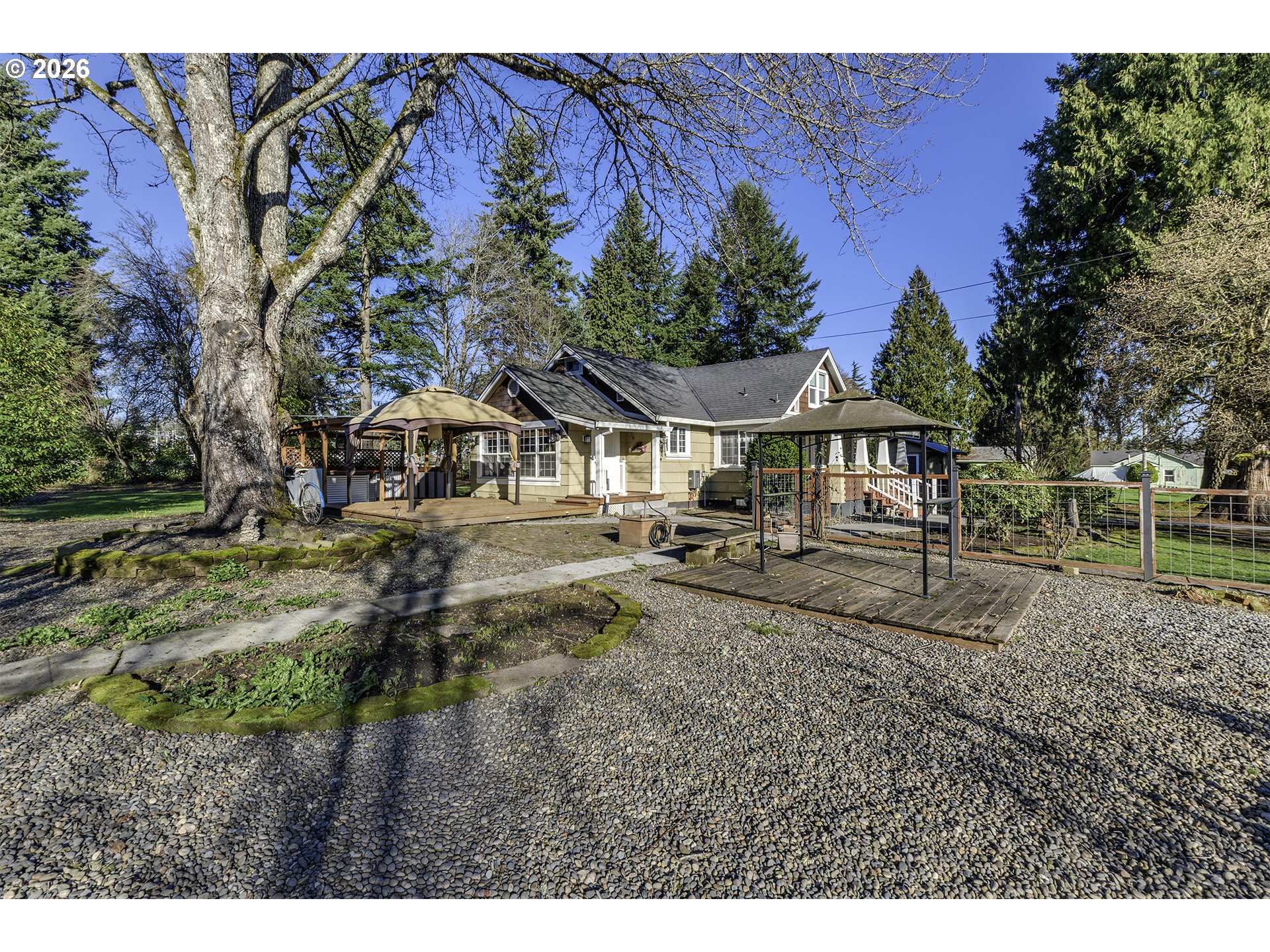 58059 Shadley Lane Warren, OR 97053 - Photo 23 of 33 a view of house with outdoor space and sitting area
