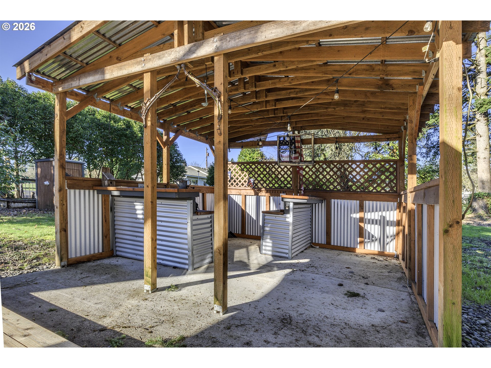 58059 Shadley Lane Warren, OR 97053 - Photo 25 of 33 a view of a backyard with a small cabin and chair