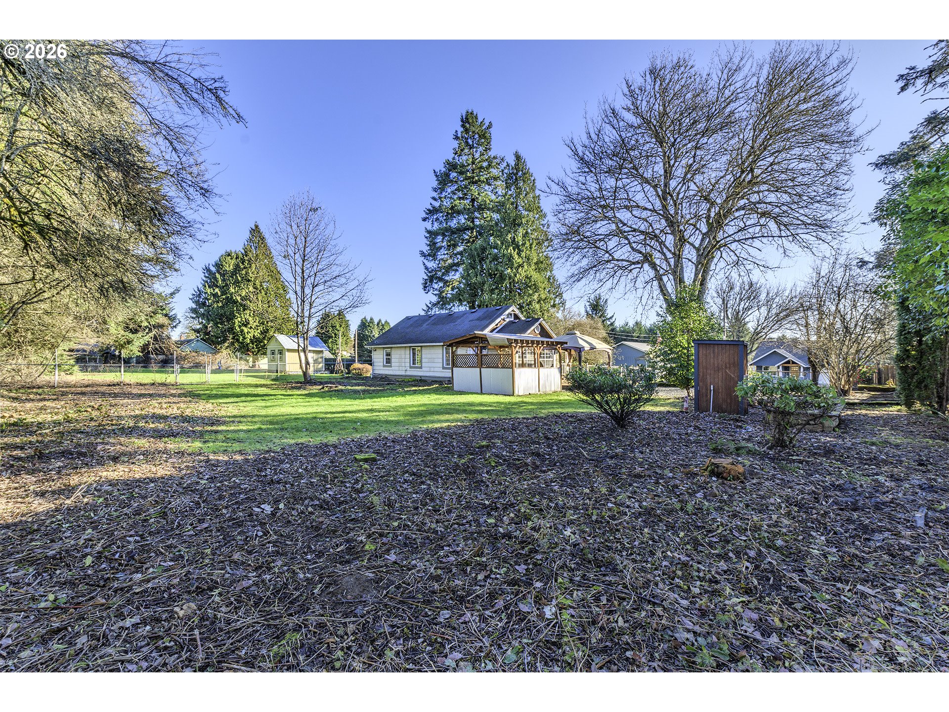 58059 Shadley Lane Warren, OR 97053 - Photo 27 of 33 a view of a house with a yard