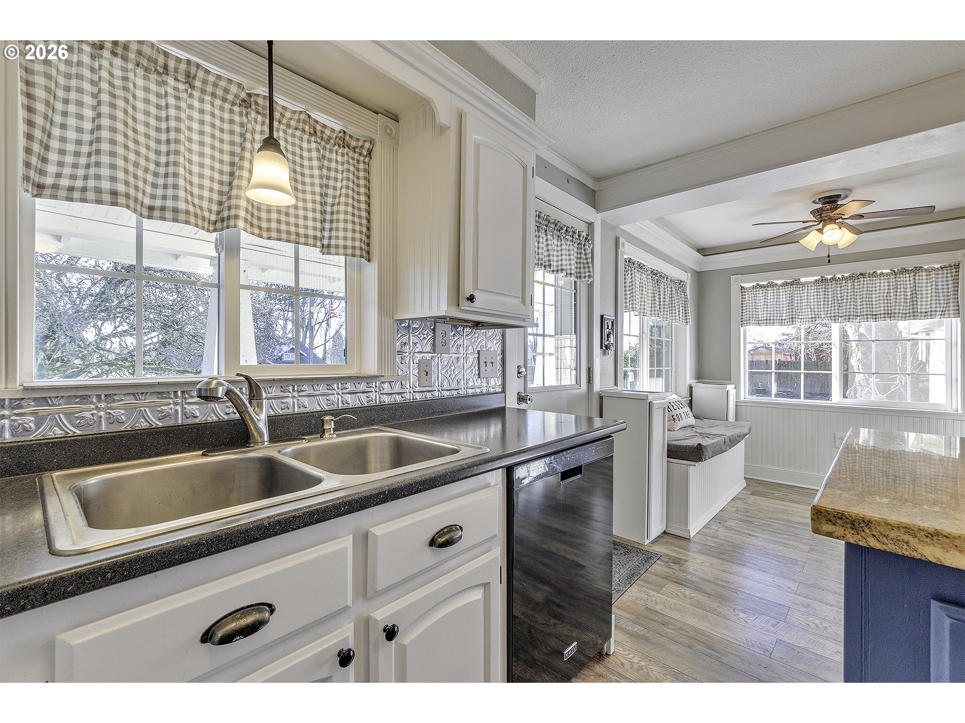58059 Shadley Lane Warren, OR 97053 - Photo 6 of 33 a kitchen with a sink and large window