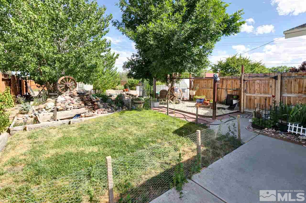 1096 Rice Road Fallon, NV 89406 - Photo 16 of 24 a view of a backyard with sitting area