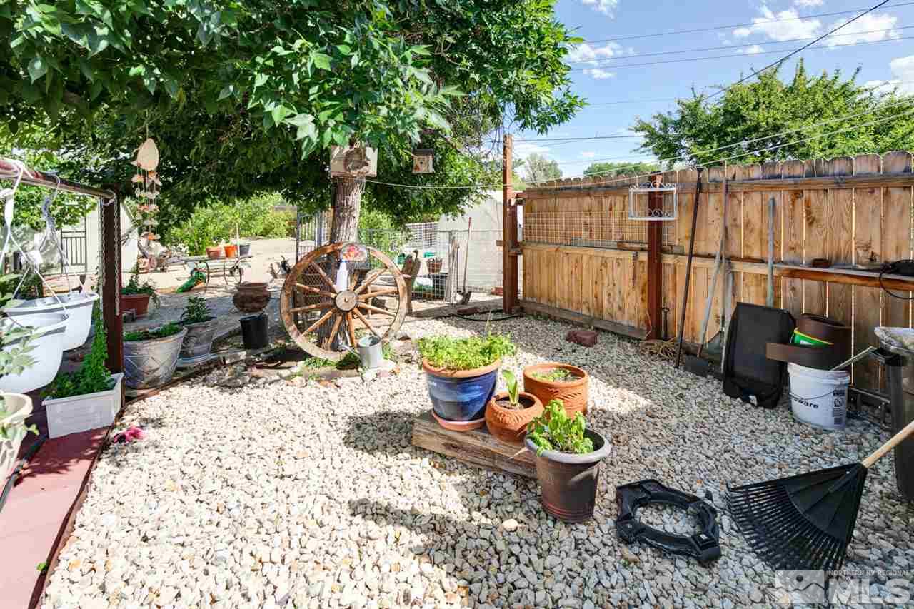 1096 Rice Road Fallon, NV 89406 - Photo 19 of 24 a view of a backyard with sitting area