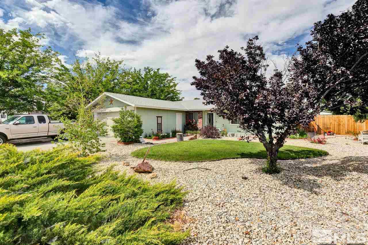 1096 Rice Road Fallon, NV 89406 - Photo 2 of 24 a front view of a house with garden