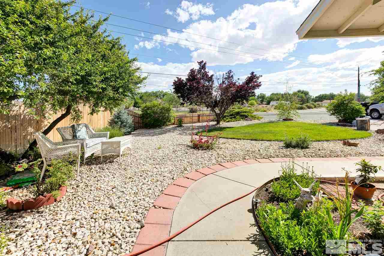 1096 Rice Road Fallon, NV 89406 - Photo 24 of 24 a bench is sitting in the middle of a yard