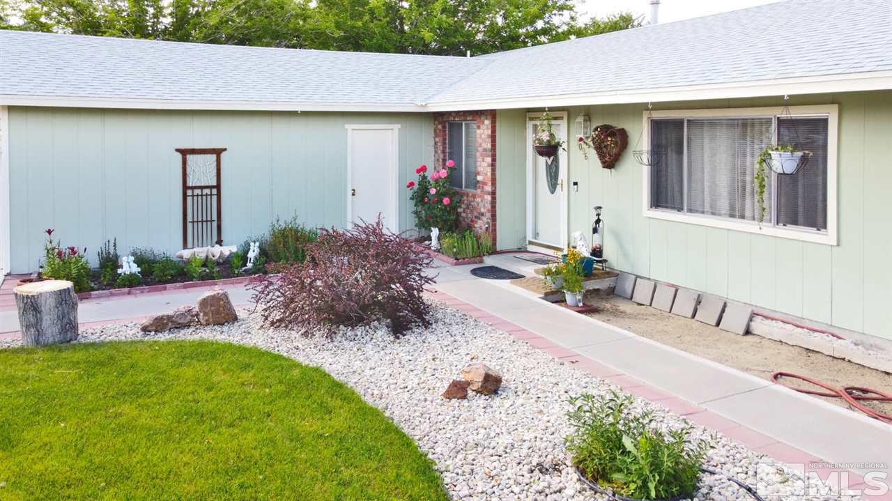 1096 Rice Road Fallon, NV 89406 - Photo 3 of 24 a front view of a house with a yard