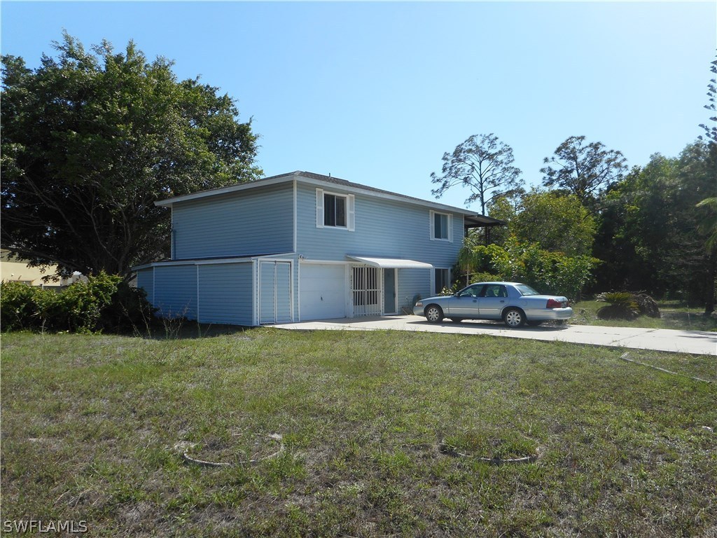 8470 Robin Road Fort Myers, FL 33967 - Photo 2 of 24 a house view with a outdoor space
