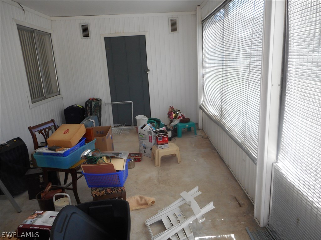 8470 Robin Road Fort Myers, FL 33967 - Photo 23 of 24 a dining room with furniture and window