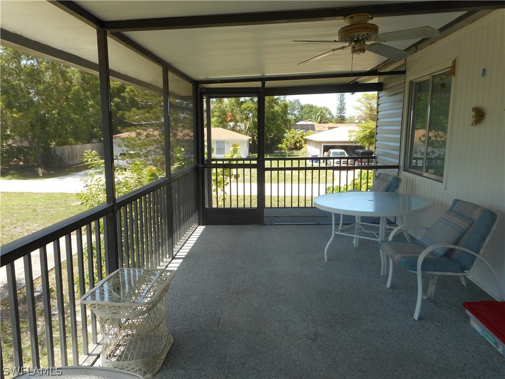 8470 Robin Road Fort Myers, FL 33967 - Photo 3 of 24 a view of a chairs and table in the balcony
