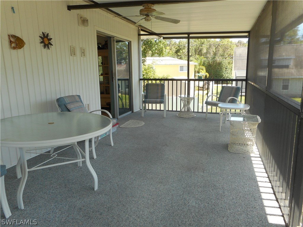 8470 Robin Road Fort Myers, FL 33967 - Photo 4 of 24 a dining room with furniture and a window