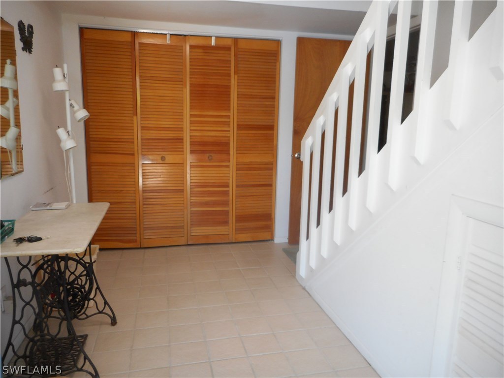 8470 Robin Road Fort Myers, FL 33967 - Photo 5 of 24 a view of a hallway with seating area