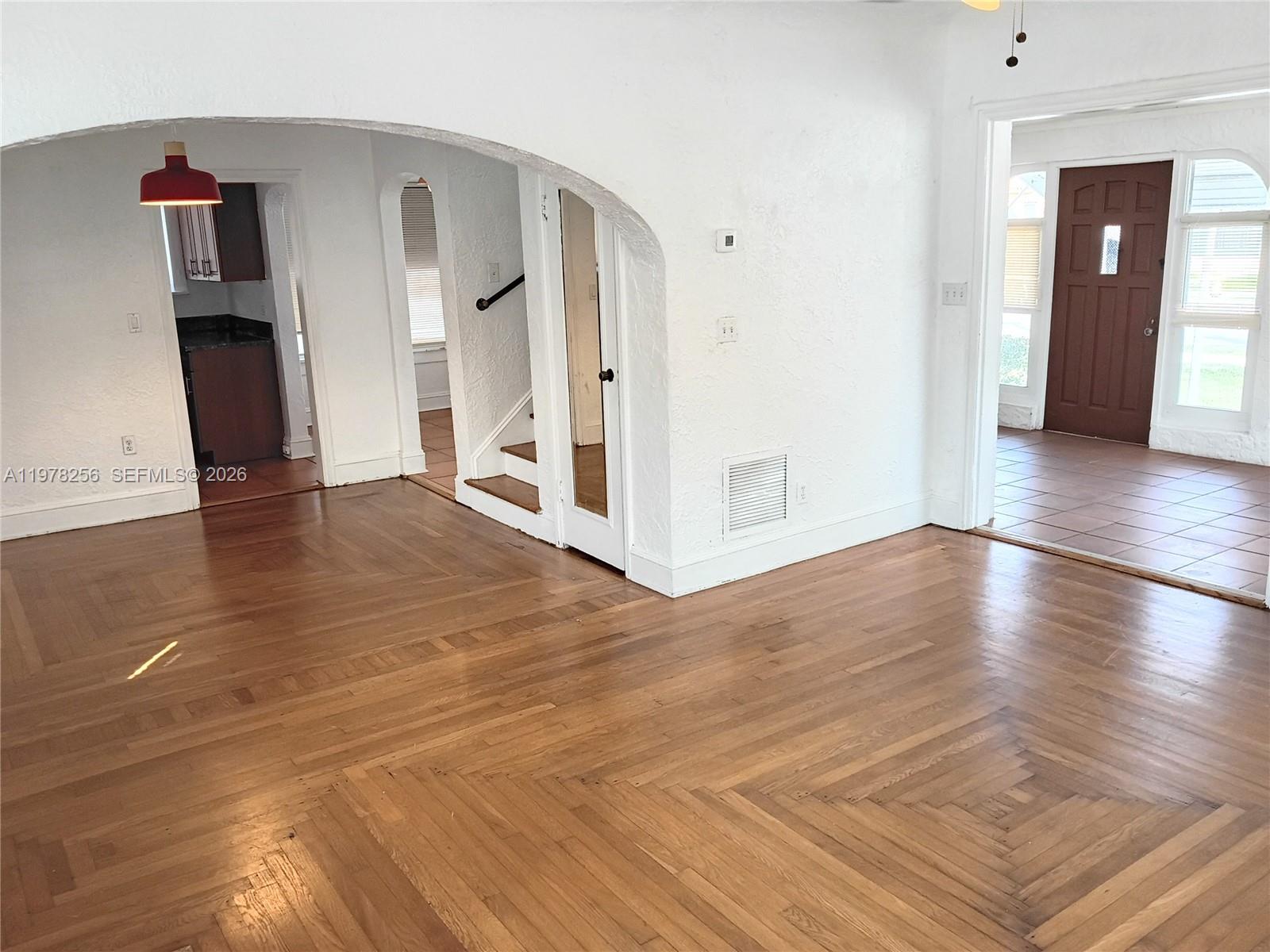 2346 Southwest 20th Street Miami, FL 33145 - Photo 4 of 14 a view of a livingroom with wooden floor